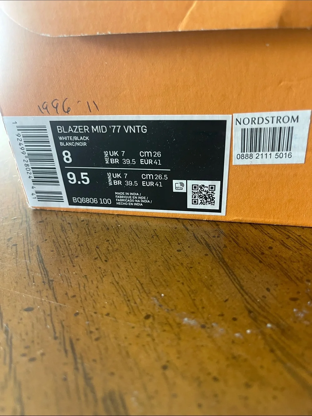 Nike Size 8 White High-Top Sneakers with Black Swoosh